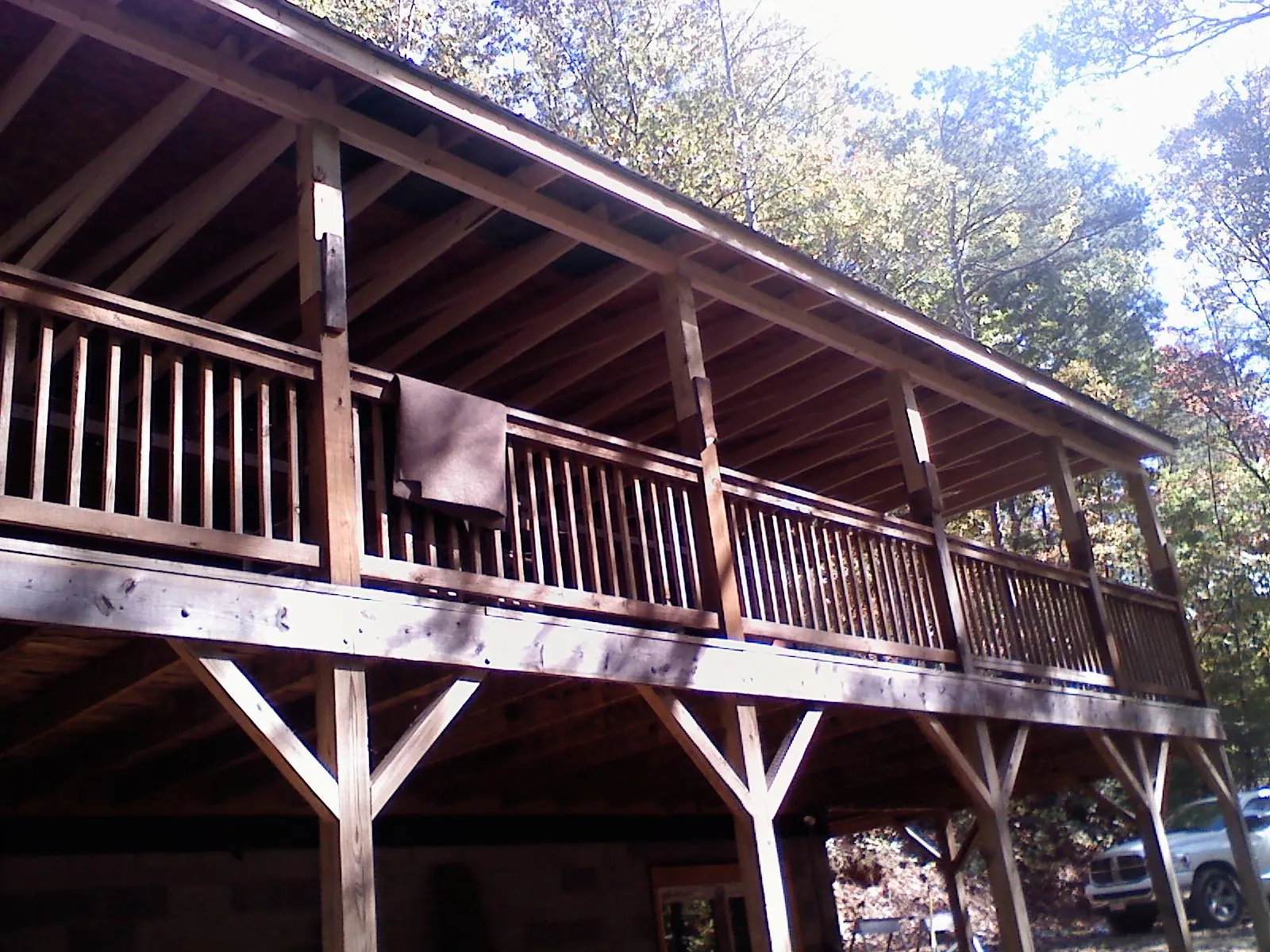 Timber framing under a new elevated porch and deck — Roof Leak Repair in Tropic by Roofing Brothers